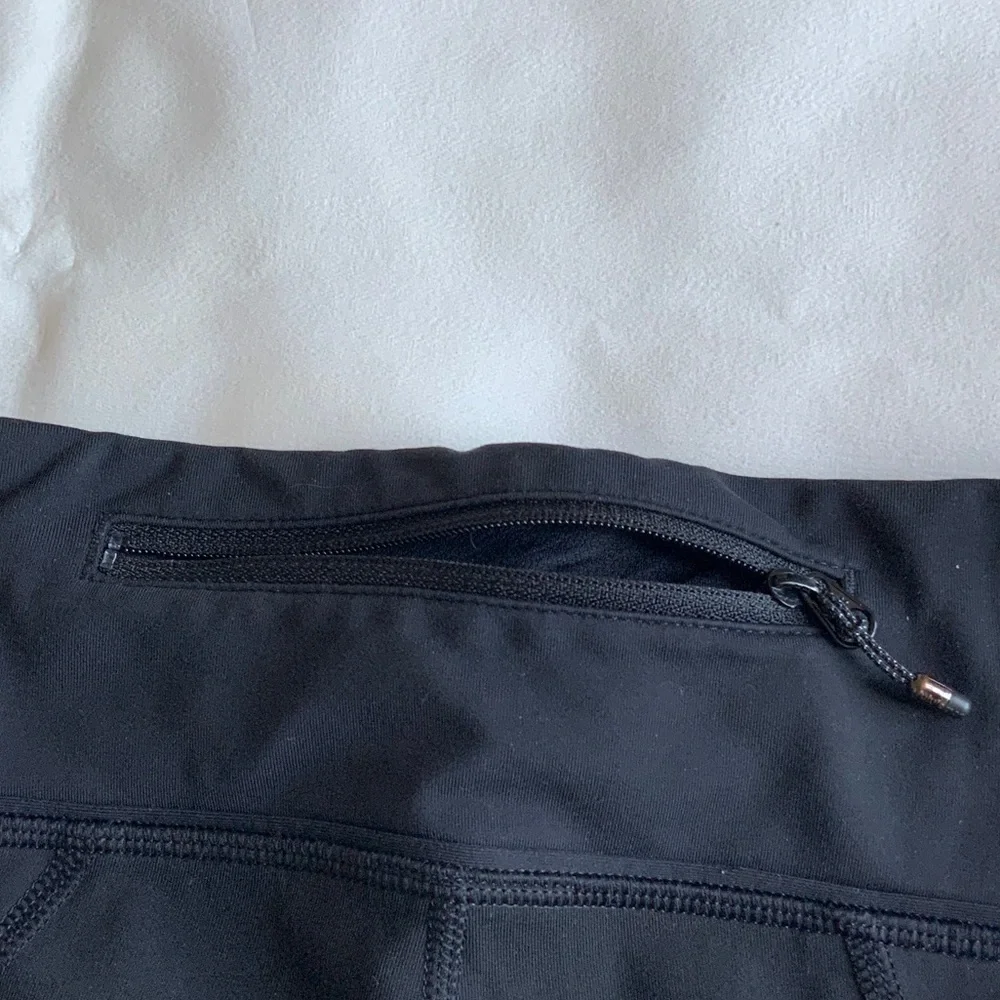 Lululemon Athletica Soul cicle capri Black Leggings with Red Skull Design
